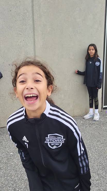 Two young players wearing North York Storm team clothing